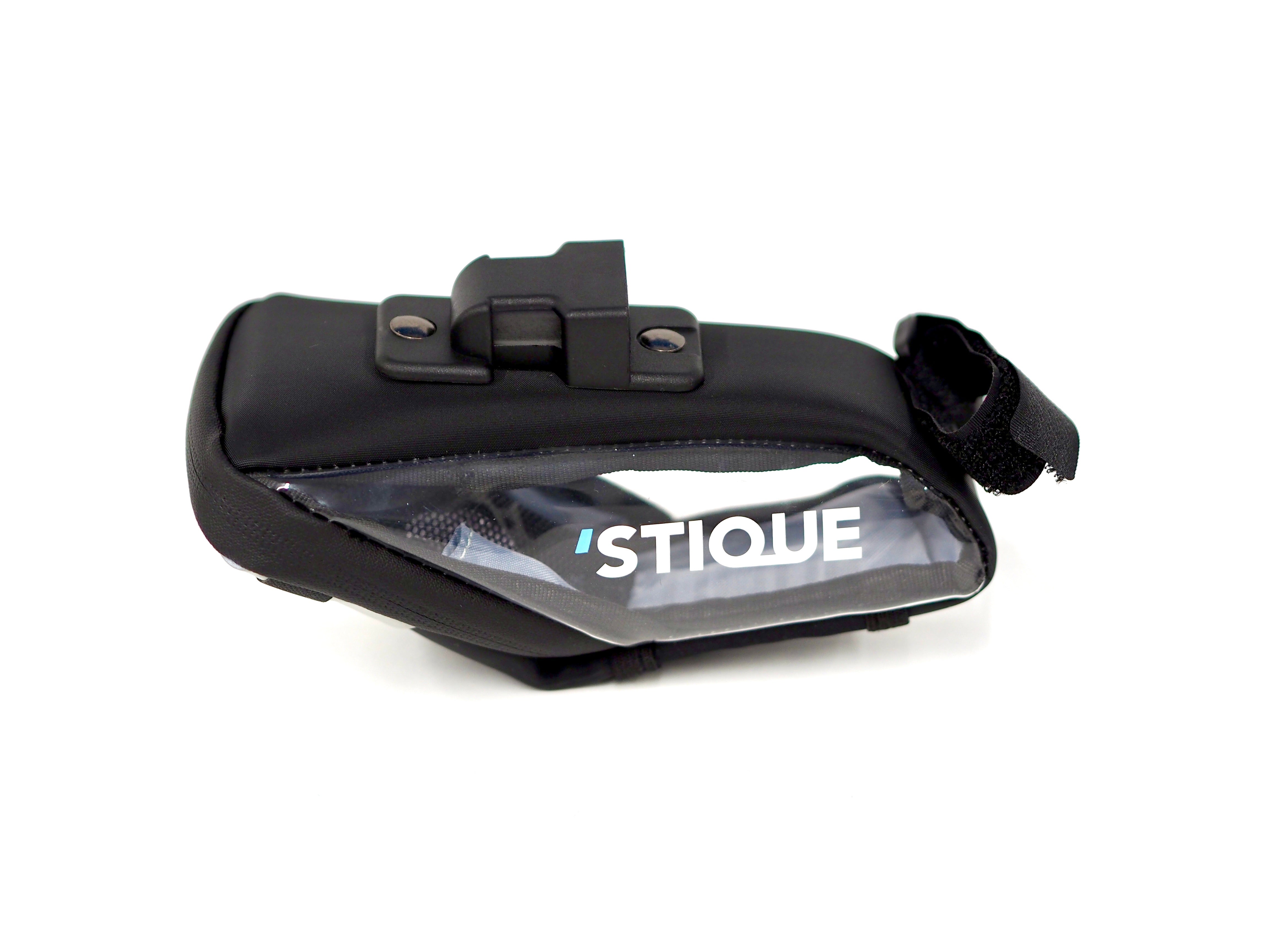 Side view of Stique SaddleGuard saddle bag showing transparent panel and Velcro strap on white background